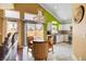 Eat in kitchen boasts white cabinets, stainless appliances, and ample light at 8988 Dusseldorf Way, Las Vegas, NV 89147