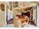 Large living room with an elegant chandelier and an open floor plan with a fireplace at 8988 Dusseldorf Way, Las Vegas, NV 89147