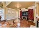 Chic living room with fireplace, modern glass table, and stylish furnishings at 8988 Dusseldorf Way, Las Vegas, NV 89147
