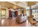 Cozy living room featuring hardwood floors, custom millwork, and natural lighting at 8988 Dusseldorf Way, Las Vegas, NV 89147