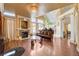 Spacious living room with fireplace, modern glass table, and stylish furnishings at 8988 Dusseldorf Way, Las Vegas, NV 89147