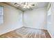 Bright and airy bedroom with carpet flooring and natural light from large windows at 9160 Moose Country Pl, Las Vegas, NV 89178