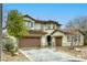 Attractive two-story house with a three car garage and easy to care for landscaping at 9160 Moose Country Pl, Las Vegas, NV 89178