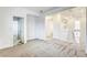 Hallway with carpeted floor and an open staircase at 9160 Moose Country Pl, Las Vegas, NV 89178