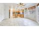 Bright kitchen with wood cabinets, an island, and modern appliances at 9160 Moose Country Pl, Las Vegas, NV 89178
