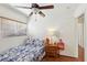 Cozy bedroom with a twin bed, hardwood floors, and blinds on the window at 1019 Amber Gate St, Henderson, NV 89002
