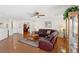 Spacious living room boasts hardwood floors, a comfortable leather sectional, and an open layout at 1019 Amber Gate St, Henderson, NV 89002