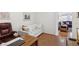 Cozy office with wood floors, comfortable seating, and desk space, perfect for remote work or study at 1019 Amber Gate St, Henderson, NV 89002