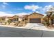 Charming single-Gathering home with a well-maintained yard and an attached three-car garage at 10260 Hawks Wing St, Las Vegas, NV 89178