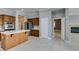Kitchen with center island and stainless appliances near living area at 10260 Hawks Wing St, Las Vegas, NV 89178