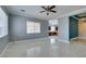 Marble floors enhance this spacious living area, naturally lit with views of the kitchen at 10260 Hawks Wing St, Las Vegas, NV 89178