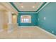 Spacious living room with an open concept design, recessed lighting and bright walls at 10260 Hawks Wing St, Las Vegas, NV 89178