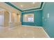 Bright living room featuring travertine floors and elegant architectural details at 10260 Hawks Wing St, Las Vegas, NV 89178