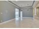 Bright living area featuring marble flooring, recessed lighting, and seamless flow to other rooms for modern living at 10260 Hawks Wing St, Las Vegas, NV 89178