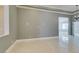 Open living area featuring marble floors, recessed lighting, and a neutral color scheme for a modern feel at 10260 Hawks Wing St, Las Vegas, NV 89178