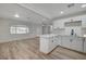 Inviting kitchen space featuring modern appliances, sleek countertops, and an open view to the living area at 105 Ash St, Henderson, NV 89015