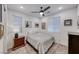 Inviting bedroom with a queen bed, soft carpet, and a dark wood nightstand at 122 Cabaletta Ln, Henderson, NV 89015
