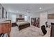 Bedroom with warm, natural light, ceiling fan, and carpet flooring at 122 Cabaletta Ln, Henderson, NV 89015