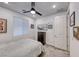 Comfortable bedroom with a bed, soft carpet, and simple decor at 122 Cabaletta Ln, Henderson, NV 89015