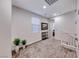 Upstairs hallway with neutral carpet and natural light at 122 Cabaletta Ln, Henderson, NV 89015