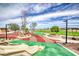 A state-of-the-art playground with slides and climbing structures is perfect for outdoor play and recreation at 122 Cabaletta Ln, Henderson, NV 89015