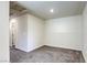 Clean, unfurnished bedroom with neutral carpet and light walls ready for customization at 12728 Feathersong St, Henderson, NV 89044