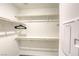 Walk-in closet with shelving and ample storage space at 12728 Feathersong St, Henderson, NV 89044