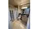 Bathroom with shower and tub combination, featuring tile floors, and vanity with granite counters at 220 Flamingo Rd # 210, Las Vegas, NV 89169