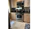 Updated kitchen features stainless steel gas range and appliances at 220 Flamingo Rd # 210, Las Vegas, NV 89169