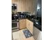 Efficient kitchen features stainless steel appliances and granite countertops at 220 Flamingo Rd # 210, Las Vegas, NV 89169