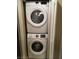Stacked white Samsung washer and dryer in closet at 220 Flamingo Rd # 210, Las Vegas, NV 89169
