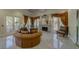 Living room features a fireplace, marble floors, and natural light from windows at 220 Flamingo Rd # 210, Las Vegas, NV 89169