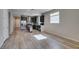 Spacious kitchen featuring stainless steel appliances, dark cabinets, and hardwood flooring at 221 Mountain Cedar Ct, North Las Vegas, NV 89031