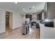 Bright kitchen with stainless appliances, center island, and decorative backsplash at 221 Mountain Cedar Ct, North Las Vegas, NV 89031