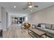 Open floorplan with wood floors, modern furniture, and recessed lighting at 221 Mountain Cedar Ct, North Las Vegas, NV 89031
