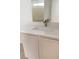 Bathroom vanity with shaker cabinets and quartz countertop with modern faucet at 2431 Lilac Cove St, Las Vegas, NV 89135
