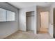 Carpeted bedroom with closet and window at 2431 Lilac Cove St, Las Vegas, NV 89135