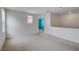 Expansive bonus room featuring abundant natural light, and neutral color palette, perfect for recreation or relaxation at 2431 Lilac Cove St, Las Vegas, NV 89135