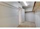 This is a walk-in closet with rod and wire rack shelving perfect for organization at 2431 Lilac Cove St, Las Vegas, NV 89135