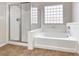 Bright bathroom with a separate shower and soaking tub at 2528 Flodden St, Henderson, NV 89044