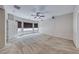 Large bedroom with a ceiling fan, neutral walls, and ample natural light at 2528 Flodden St, Henderson, NV 89044