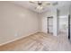 This carpeted bedroom features a ceiling fan and closet at 2528 Flodden St, Henderson, NV 89044