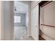 View from hallway into the bedroom, showcasing the neutral palette and a closet at 2528 Flodden St, Henderson, NV 89044