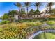 Anthem Highlands entrance with vibrant flowers and well-manicured greenery at 2528 Flodden St, Henderson, NV 89044