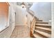 Grand foyer featuring tile flooring, a staircase, and a soaring ceiling at 2528 Flodden St, Henderson, NV 89044