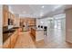 Bright kitchen featuring a large island with seating and stainless steel appliances at 2528 Flodden St, Henderson, NV 89044