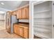 Bright kitchen featuring stainless steel refrigerator and pantry at 2528 Flodden St, Henderson, NV 89044
