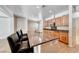 Open kitchen with granite countertops and stainless steel appliances at 2528 Flodden St, Henderson, NV 89044