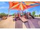 Inviting playground features a shade structure, slides, and climbing structures for outdoor fun at 2528 Flodden St, Henderson, NV 89044