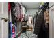 Walk-in closet featuring shelving for shoes and hanging storage for clothing at 2532 Whippoorwill Ln, Las Vegas, NV 89121